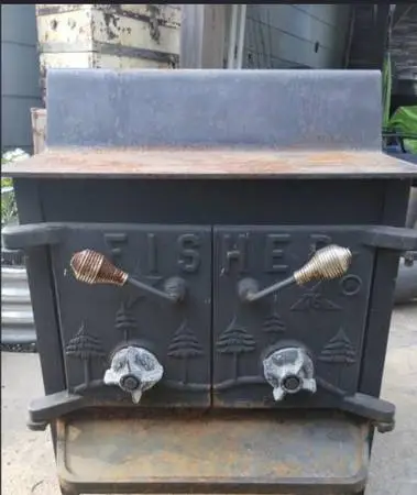 FREE FISHER WOOD STOVE