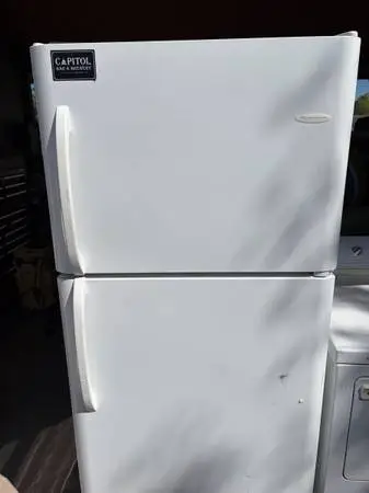A white refrigerator Frigidaire very good condition