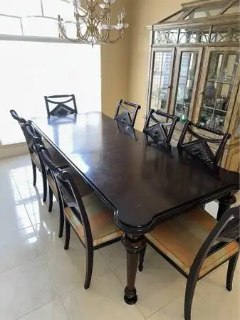 NEGOTIABLE *** Very Large and Sturdy Dining Room Table with 8 Chairs