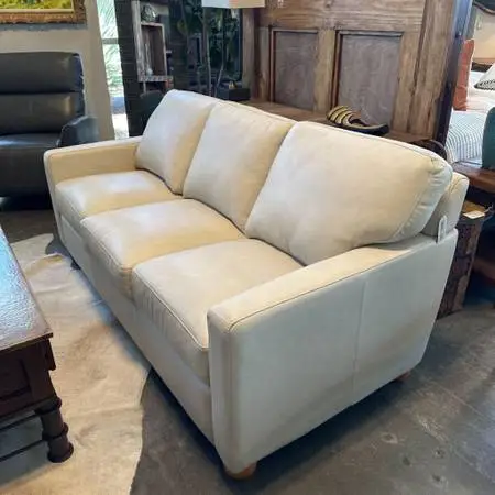 Stationary Solutions Beige Leather Sofa- 76X36X32H