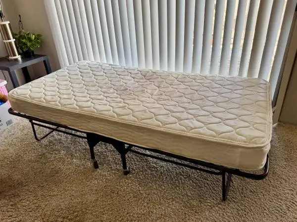 Twin Folding/Rollaway Metal Bed Frame + FREE Mattress