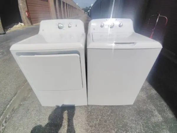 GE OVERSIZED CAPACITY WASHER AND ELECTRIC DRYER.