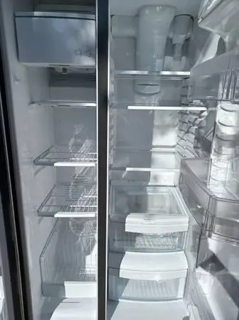 Stainless Side x side refrigerator like brand new 6 months warranty