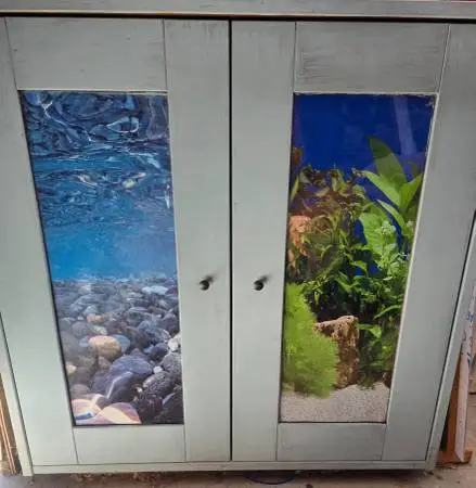 CABINET SMALL WITH OCEAN SCENERY DOORS