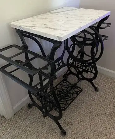 Cast iron antique sewing machine base with marble top
