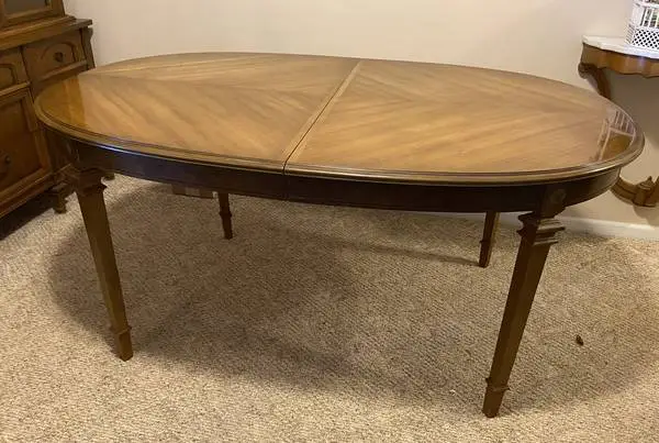 Oval dinning room table set with six chairs