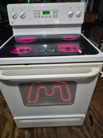G/E glass top stove/Free Delivery