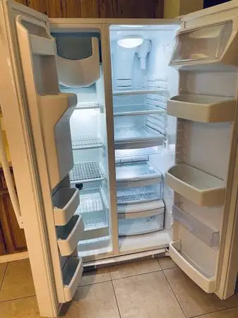 Used white side-by-side fridge