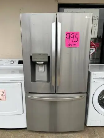 Refrigerator like new three door Warranty,, delivery Call/Text