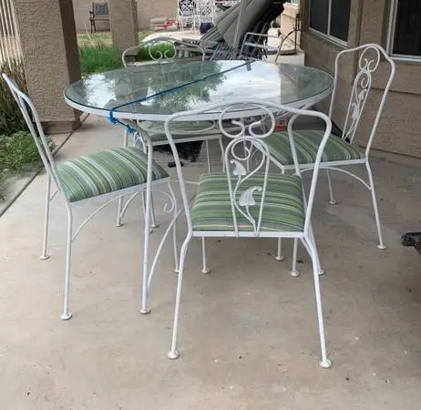 Wrought Iron table and chairs with glass top beautiful