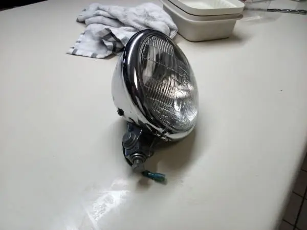 2  HARLEY,, HEADLIGHTS & BRACKET..