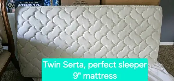 Twin Mattress Serta, perfect sleeper, 9 inches deep.