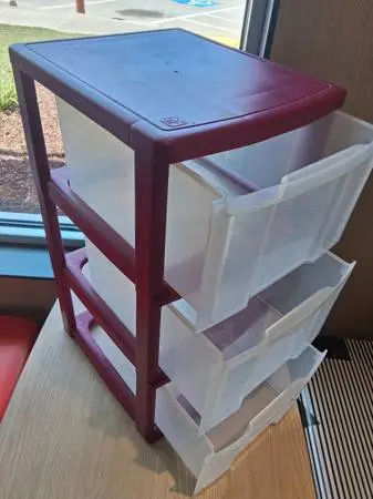 Sterlite plastic dresser, bird cage, circular side table, trunk