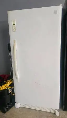 Freezer upright, adjustable thermostat