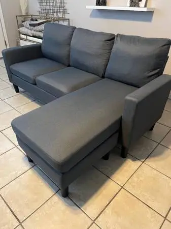 Like new, reversible sectional, gray color