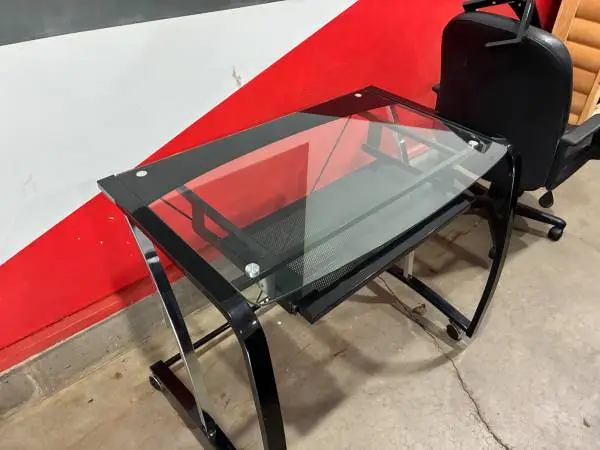 glass and metal desk and chair