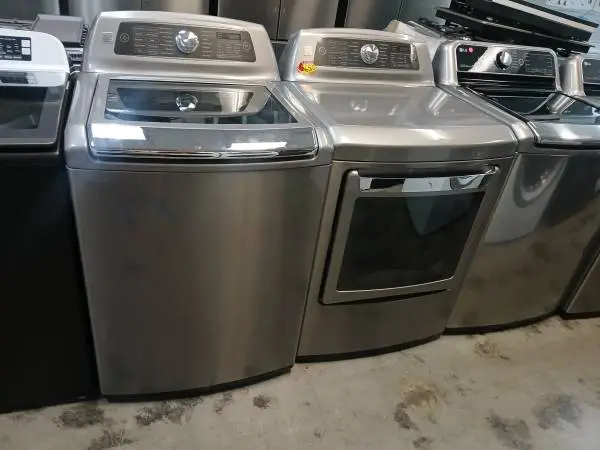 Kenmore grey steam front load washer and gas dryer