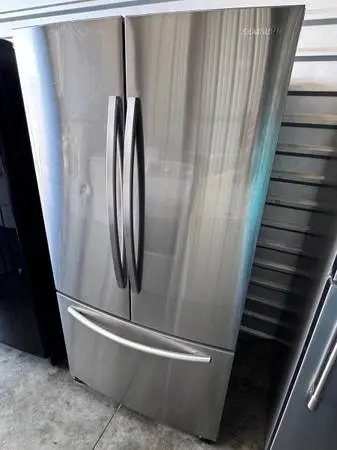 Samsung refrigerator french  3 door  stainless with ice maker
