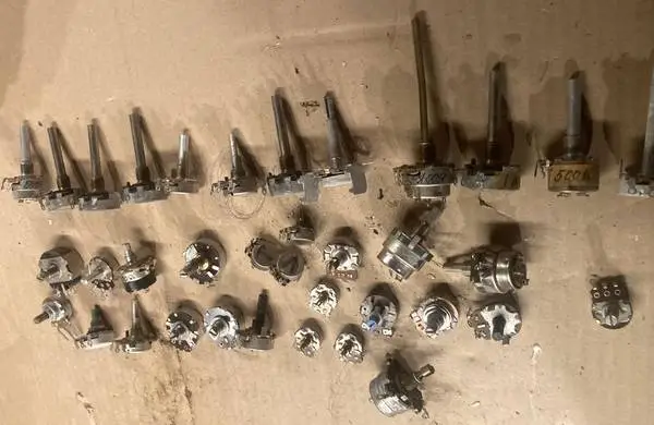 Assorted vintage potentiometers for TV and Radios