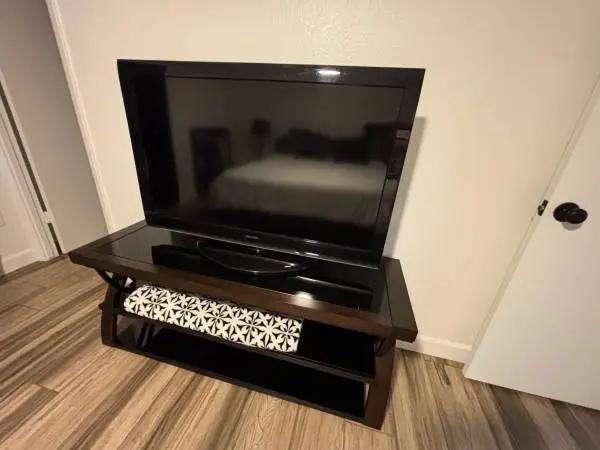 Toshiba 47” TV + High Quality Solid Wood Tempured Black Glass TV Stand