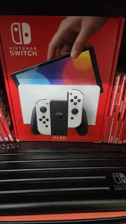 OLED Nintendo Switch with 2 sets of joy con