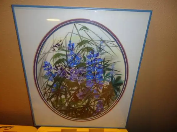 Original watercolor of flowers under framed glass