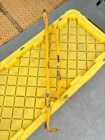 Two yellow DeWalt pry bars