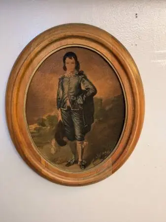 PAIR OF VINTAGE OVAL FRAMED BLUEBOY LIKE PRINTS