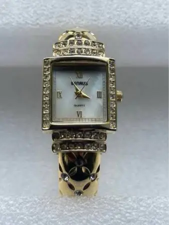 BENRUS LADIES CUFF GOLD TONE RHINESTONE WATCH