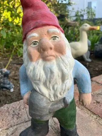 VINTAGE CAST IRON GNOME WITH WATERING CAN