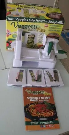 NEW TABLE-TOP SPIRAL VEGETABLE AND FRUIT SLICER