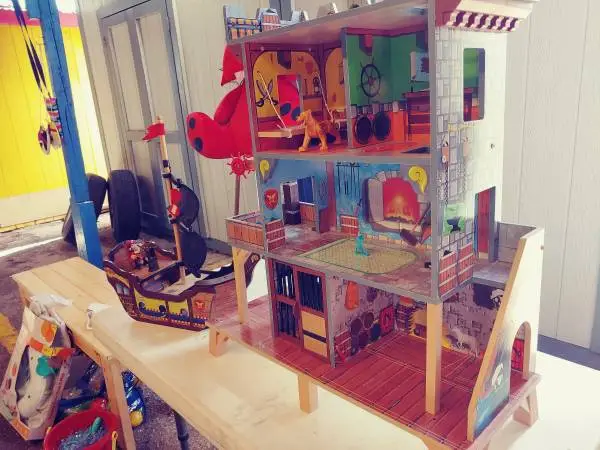 kid crafts pirate ship and castle