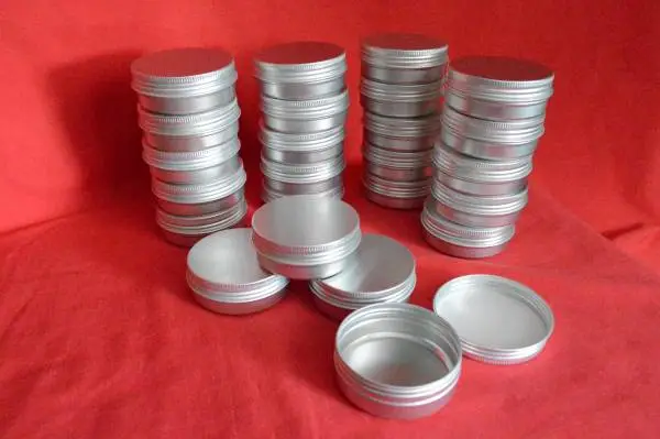 24- 2oz Aluminum Tins with lids. New!