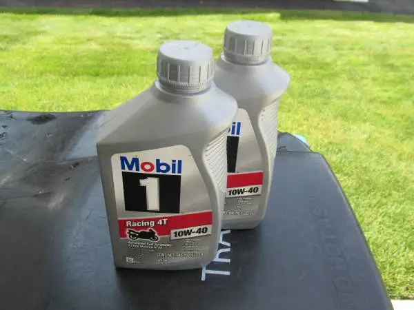 2 new, Mobil 1, 10w-40 oil, Racing 4T