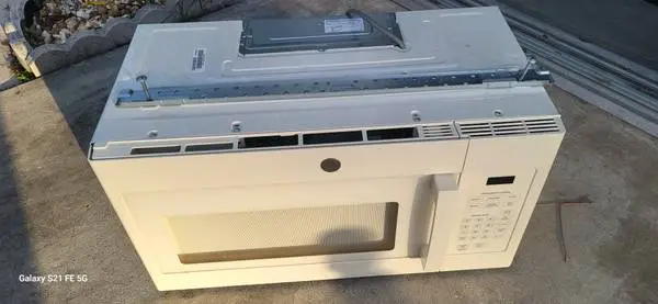 1.6 cu. ft Over the Range Microwave in Bisque color