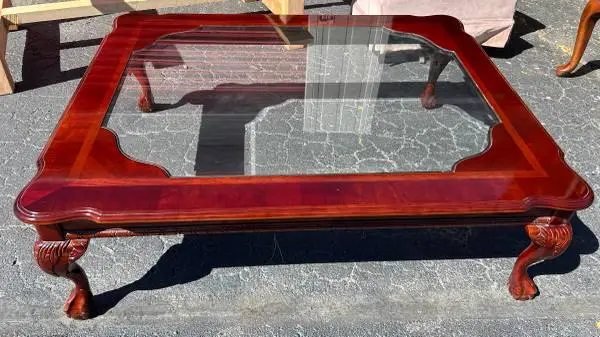 Vintage mahogany glass-top coffee table with carved ball-and-claw feet L50”*W4