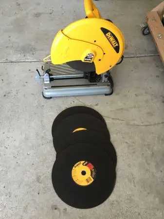 Like New Dewalt 14” Cut Off SawPlus Four  Extra Blades
