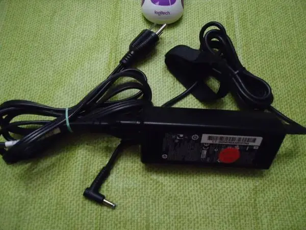 HP 65 watts laptop charger with a blue tip