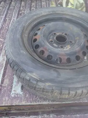 205 60 15 tires and rims, 5 lug and 4 1/2 inch pattern.