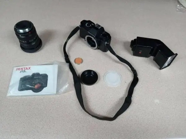 Pentax P3N w/ shoe mount flash & Takumar 28-80 mm zoom lens