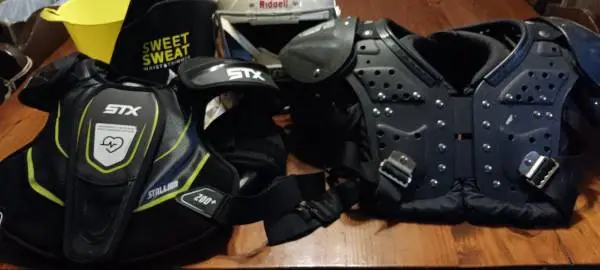 2 football shoulder pads 1 all size large$40/$50