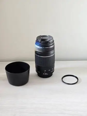 Canon 75-300mm telephoto lens, hood, UV filter