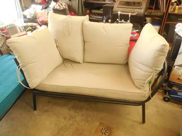 2 small indoor outdoor chairs with cushions