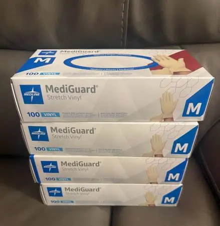 New in Box Medline MediGuard Stretch Vinyl Exam Gloves in size Medium.
