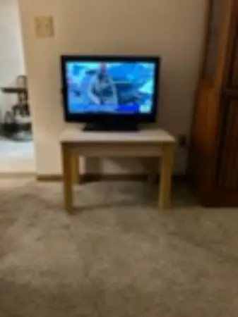 Small Emerson TV with the table you see in pic and remote and new blue ray playe