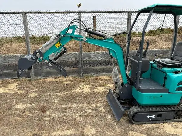 New Mini Excavator  with a Thumb also a Auger and Breaker Available