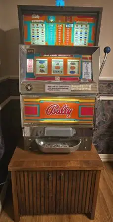 Authentic, vintage working Nevada slot machine by Bally, model 1040