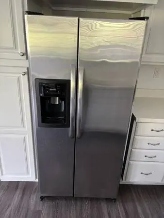 Side by side stainless refrigerator with freezer (free local delivery)