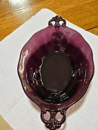 Vintage amethyst purple colored sauce bowl is from Fostoria Glass Co.