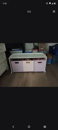 Storage bench with cubbies that slide out